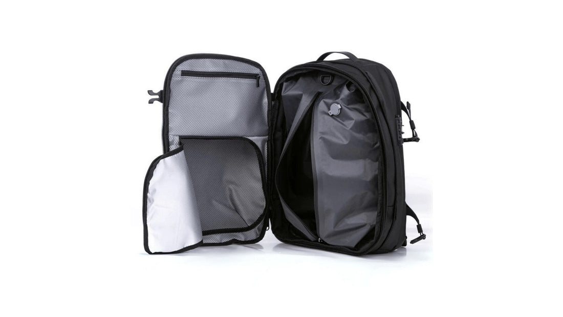 Airbag Lite travel backpack opened flat showing the main packing compartments