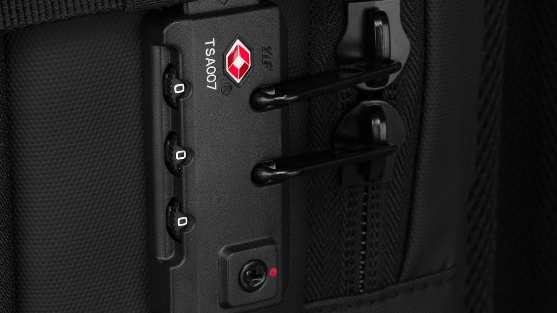 Close-up of the TSA-accepted combination lock and zips on the Airbag Lite backpack
