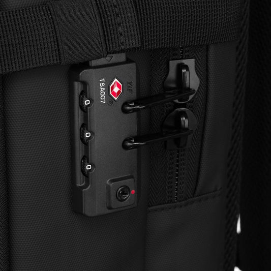 TSA-accepted combination lock fastened through the main zip pulls of the Airbag Lite carry-on backpack